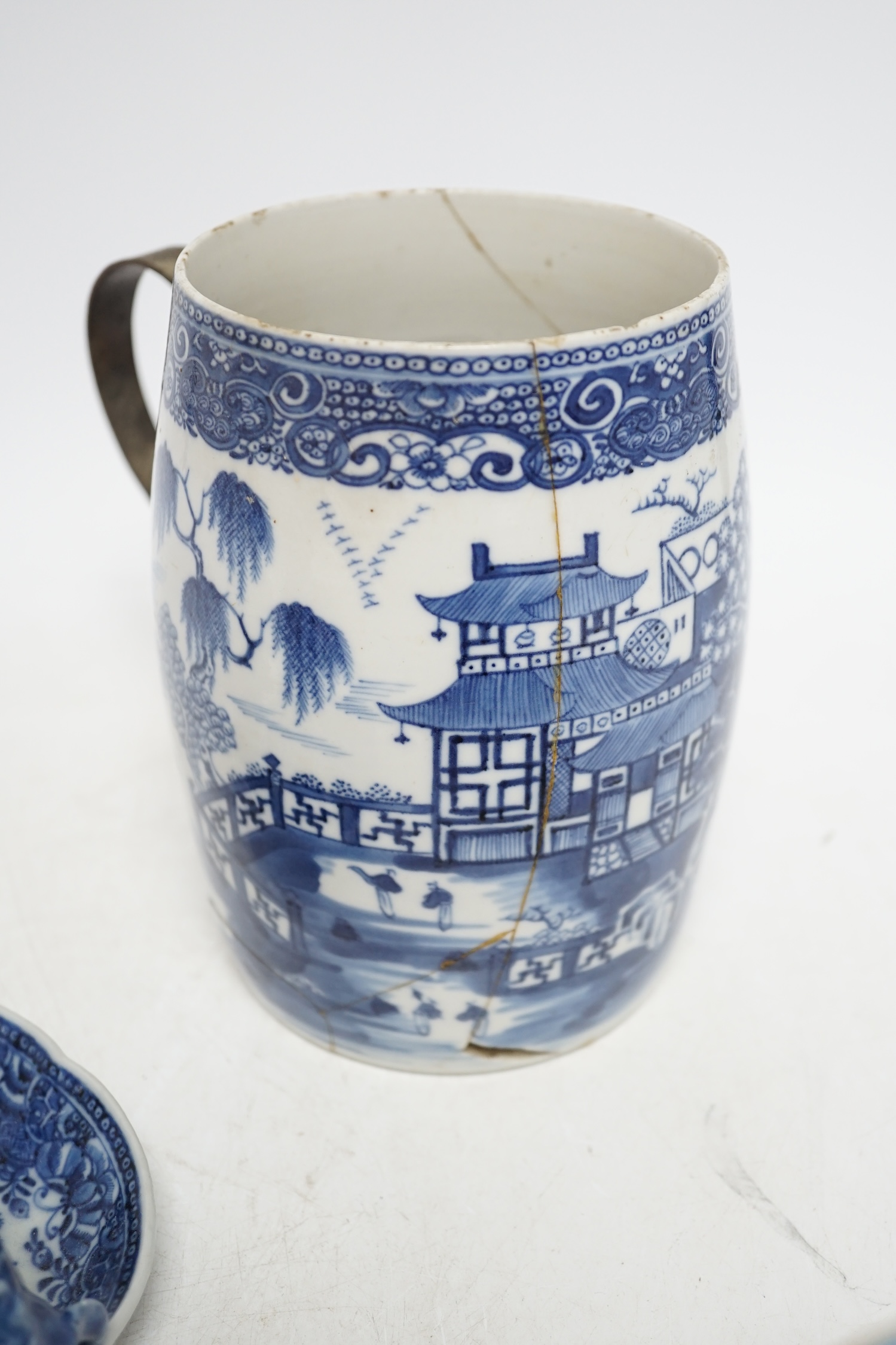 A group of five 18th century Chinese export ceramics to include a rare blue and white ‘dragon’ chamberstick, tallest 16cm. Condition - poor